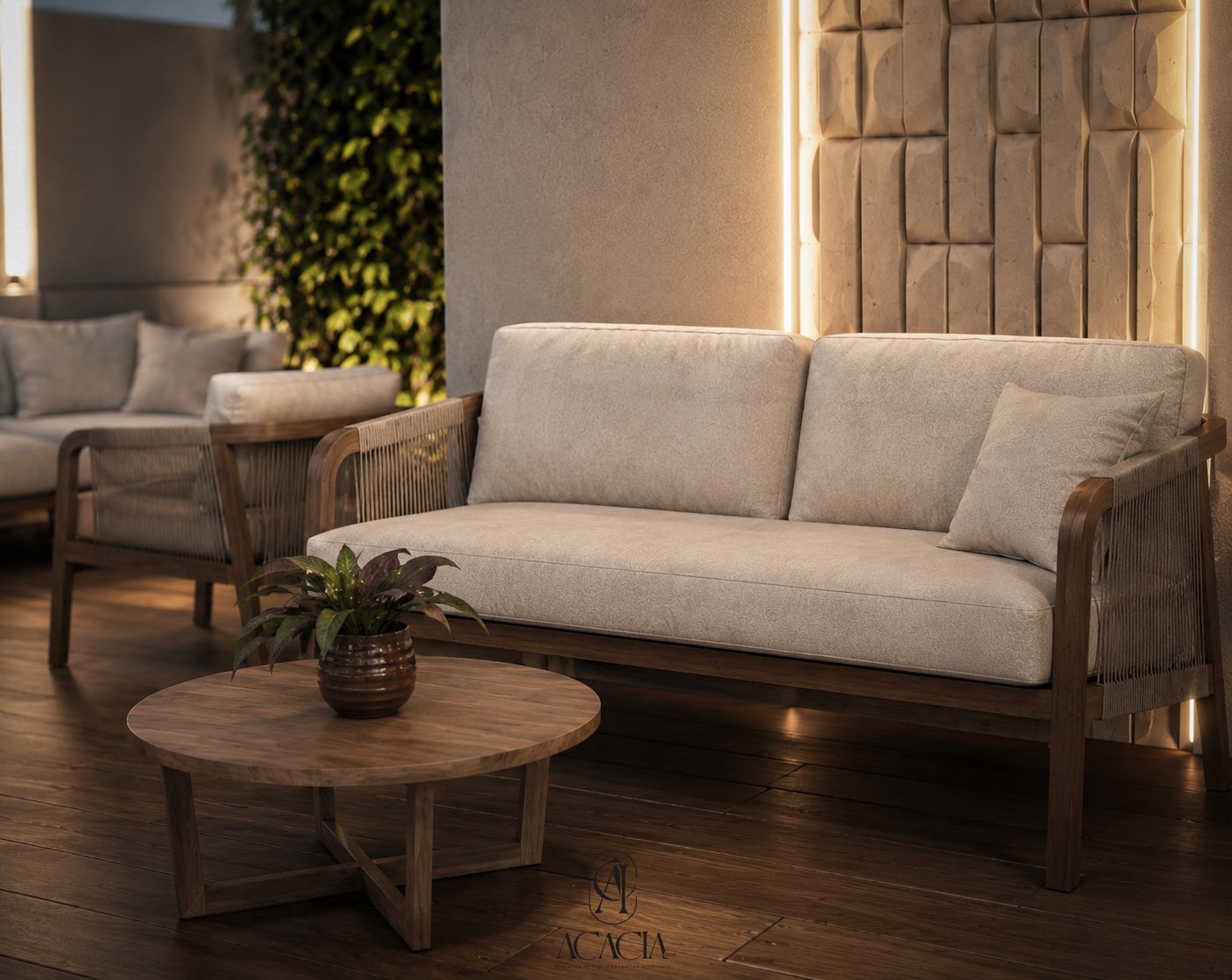 Close-up of the rope-and-oak lounge sofa and armchair with the lit feature wall